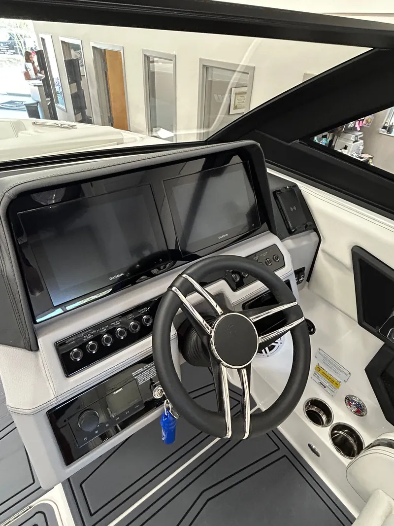 Slide: The Image of Interior view of 2025 Cobalt R4 Surf with modern dashboard. - 13