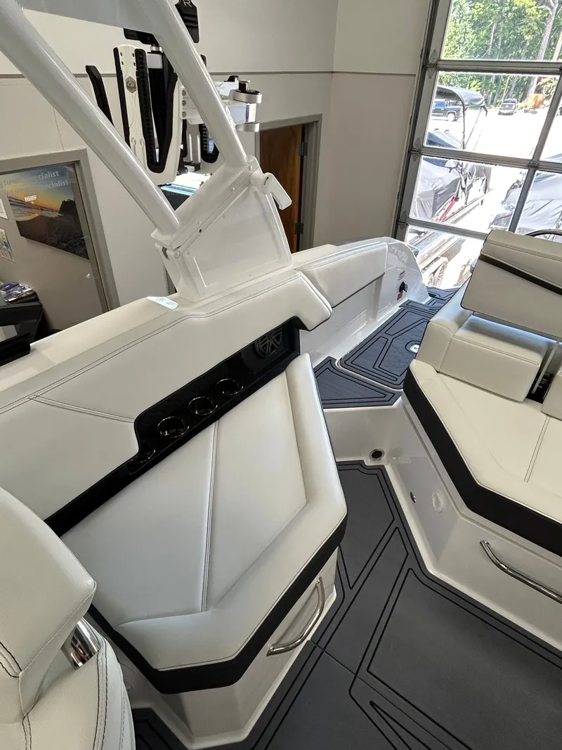 Slide: The Image of Interior of 2025 Cobalt R4 Surf boat, featuring modern seating and design. - 14
