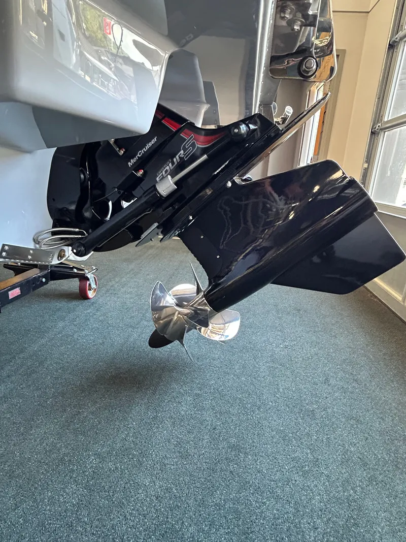Slide: The Image of 2025 Cobalt R4 Surf boat motor and propeller close-up. - 6