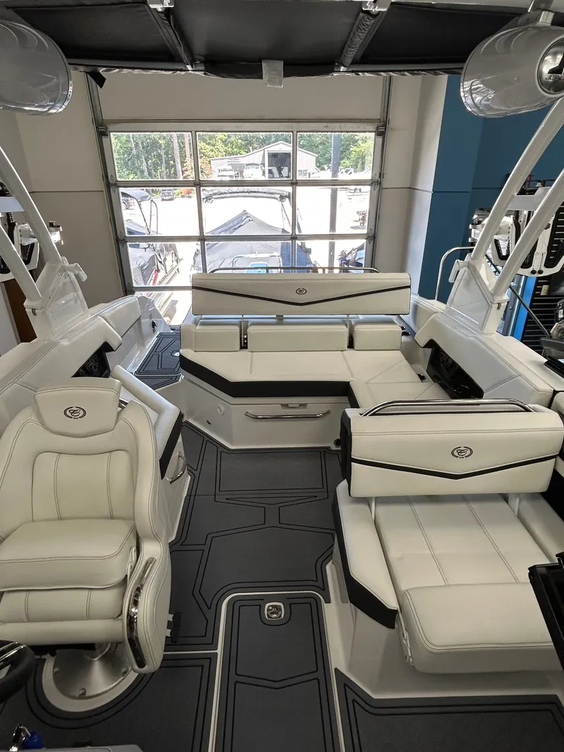 Slide: The Image of Interior of 2025 Cobalt R4 Surf with luxurious white seating. - 9