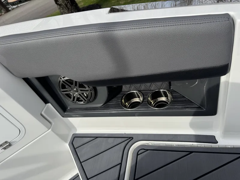 Slide: The Image of Cobalt R8 2026 boat detail with speaker and cup holders. - 12