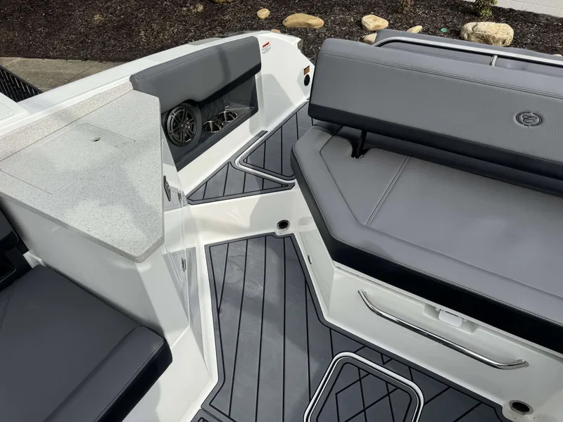 Slide: The Image of Interior of 2026 Cobalt R8 boat with gray seating and speakers. - 14