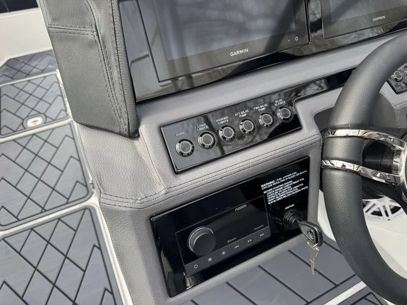 Slide: The Image of Dashboard of 2026 Cobalt R8 with Garmin displays and controls. - 18