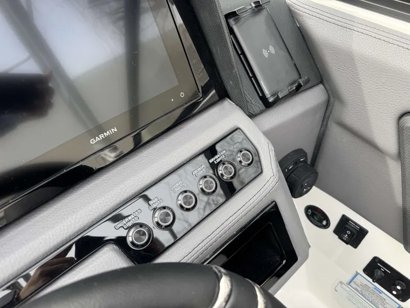 Slide: The Image of Dashboard of 2026 Cobalt R8 with Garmin display and controls. - 19
