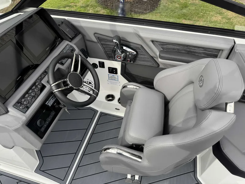 Slide: The Image of Interior of 2026 Cobalt R8 with modern helm and gray leather seating. - 20