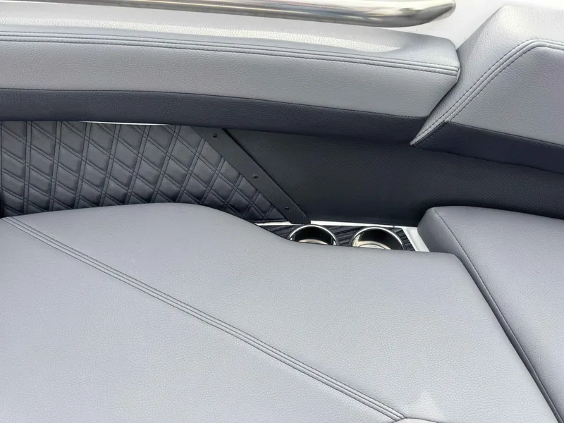 Slide: The Image of Interior of 2026 Cobalt R8 with gray leather and cup holders. - 24