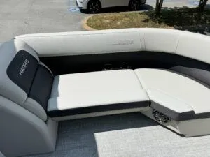 Slide: The Image of 2024 Harris CX 230 boat seating with gray upholstery. - 7
