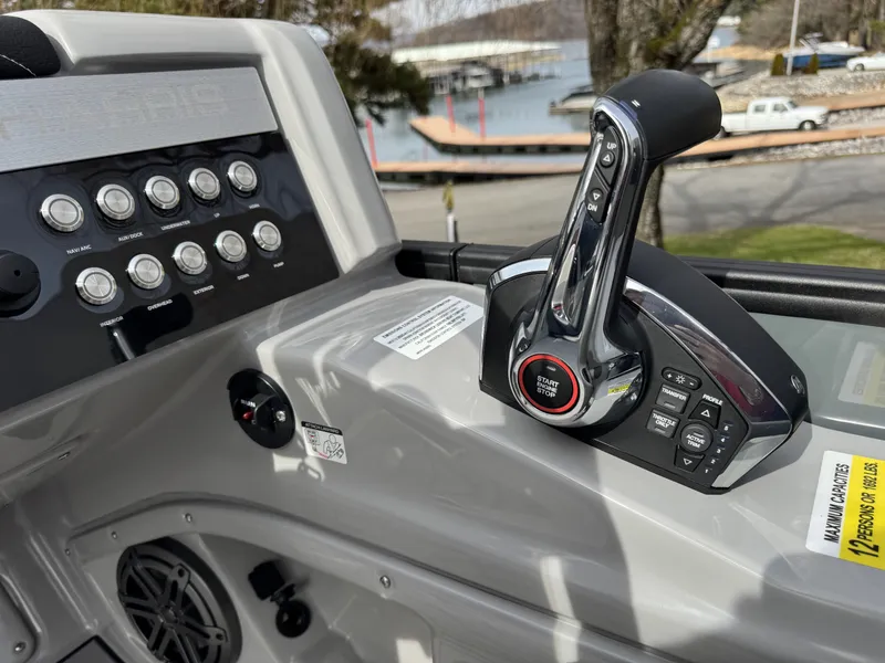 Slide: The Image of Control console of Harris Grand Mariner 230, 2025 model, featuring controls. - 21