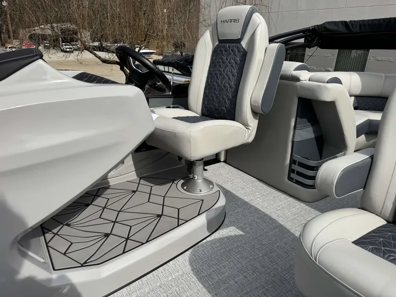 Slide: The Image of Interior of 2025 Harris Grand Mariner 230 with luxurious seating. - 23