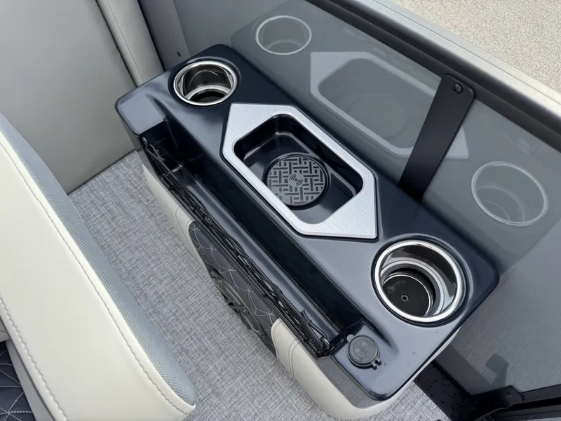 Slide: The Image of Interior of 2025 Harris Grand Mariner 230 with cup holders. - 25