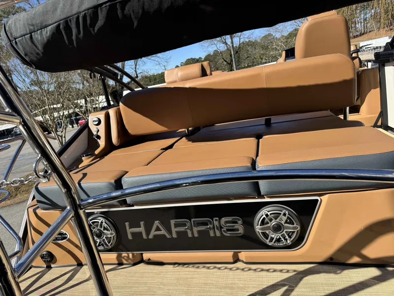 Slide: The Image of 2025 Harris Grand Mariner 250 with luxurious seating and speakers. - 10