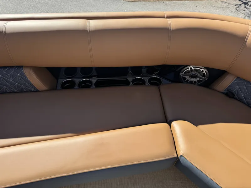 Slide: The Image of Interior of 2025 Harris Grand Mariner 250 with luxurious leather seating. - 28