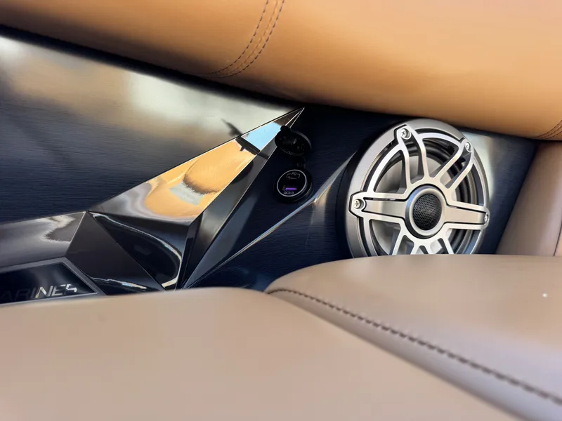 Slide: The Image of Interior of 2025 Harris Grand Mariner 250 with speaker and USB port. - 36