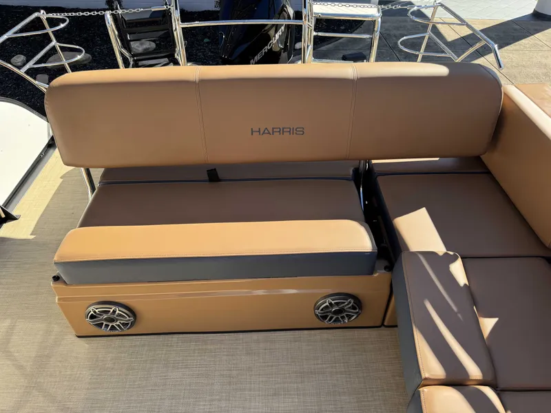 Slide: The Image of Harris Grand Mariner 250, 2025, brown leather seats with speakers. - 8