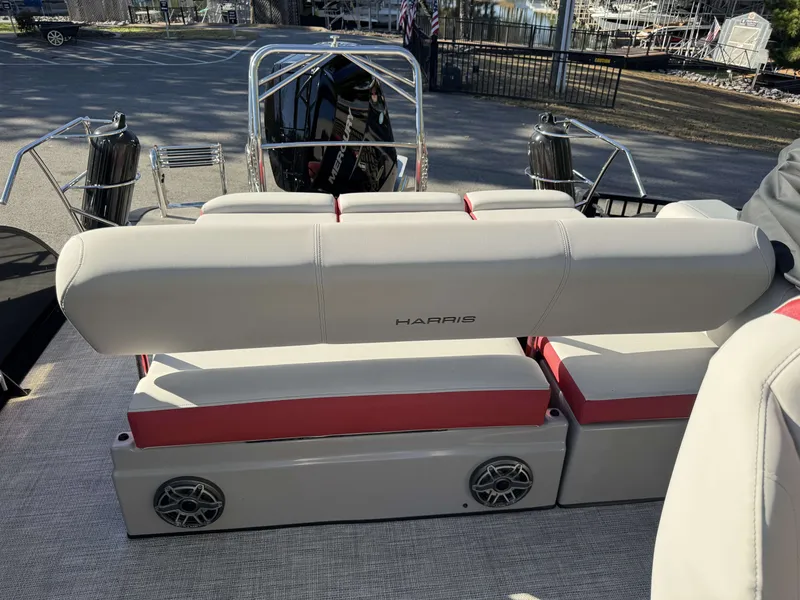 Slide: The Image of 2024 Harris Grand Mariner 250 boat rear seating and engine view. - 23