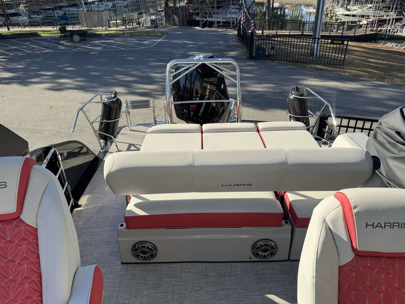 Slide: The Image of 2024 Harris Grand Mariner 250 interior with luxurious seating and speakers. - 24