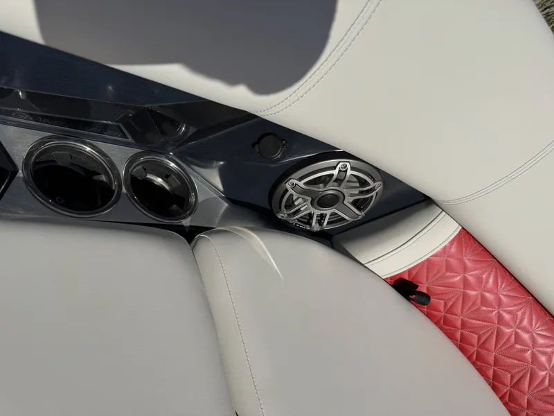 Slide: The Image of Interior of 2024 Harris Grand Mariner 250 with speaker and red upholstery. - 7