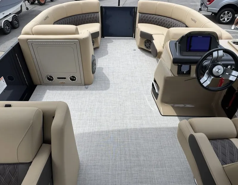 Slide: The Image of Interior of Harris SUN 210 pontoon boat, 2025 model, featuring luxurious seating. - 17