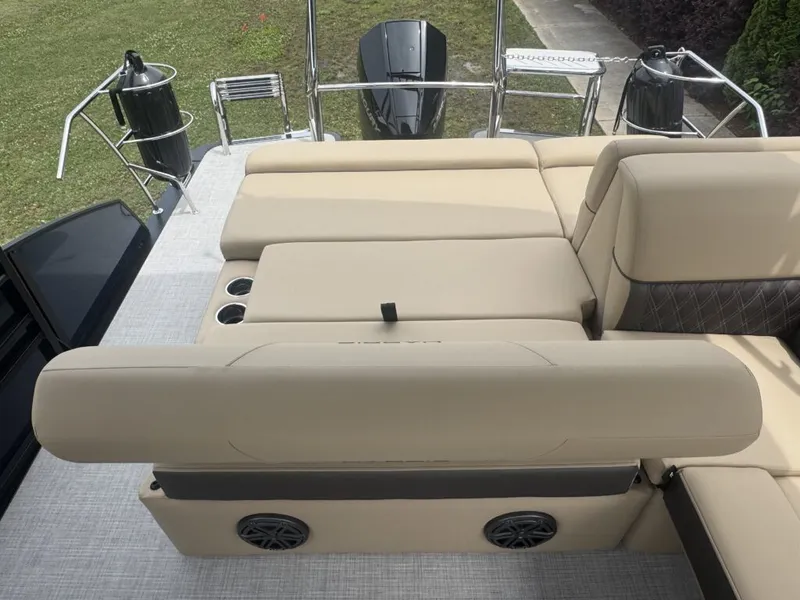 Slide: The Image of Harris SUN 210 boat 2025 with beige cushioned seating. - 20