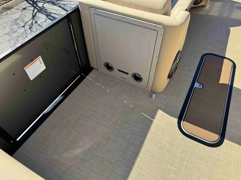 Slide: The Image of Interior of a 2025 Harris SUN 250 boat with beige upholstery. - 11