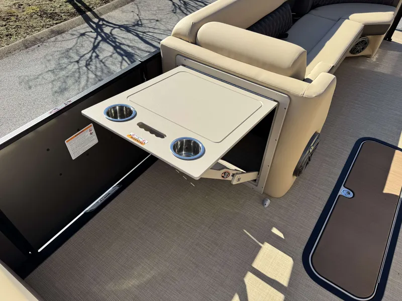 Slide: The Image of Harris SUN 250 boat with fold-out table and cup holders, 2025 model. - 12