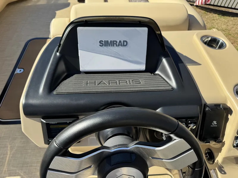 Slide: The Image of Harris SUN 250 boat dashboard with Simrad display, year 2025. - 14