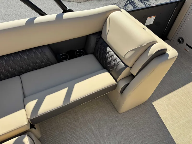 Slide: The Image of Luxurious seating on Harris SUN 250 pontoon boat, model year 2025. - 9
