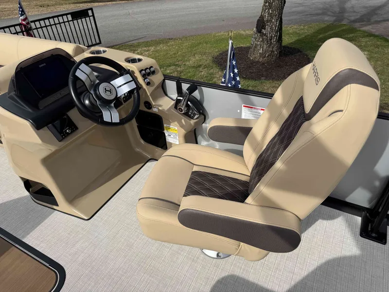 Slide: The Image of Interior of 2025 Harris SUN 250 SPORT with beige seat and steering wheel. - 10