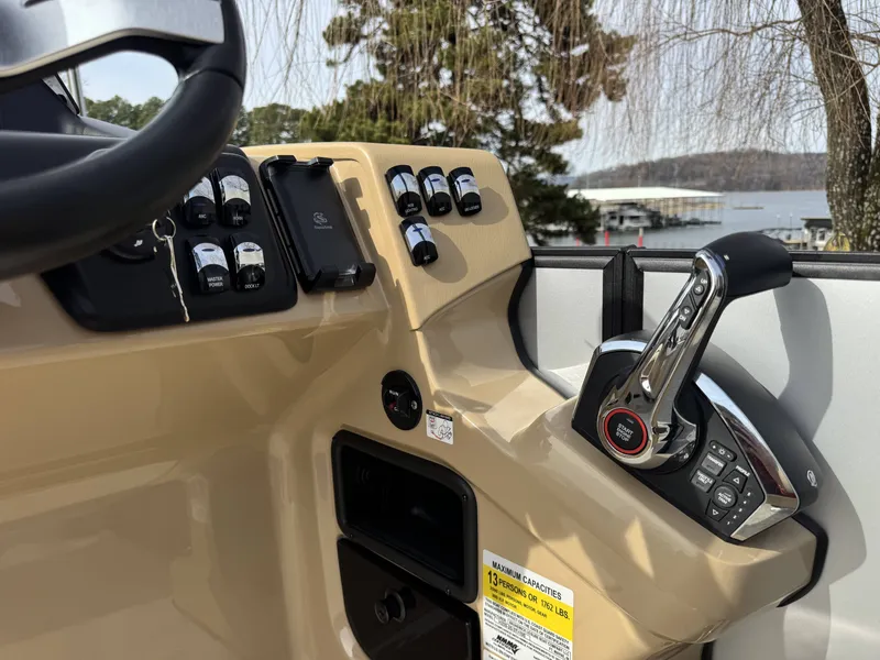 Slide: The Image of Dashboard of Harris SUN 250 SPORT 2025 with control lever. - 13