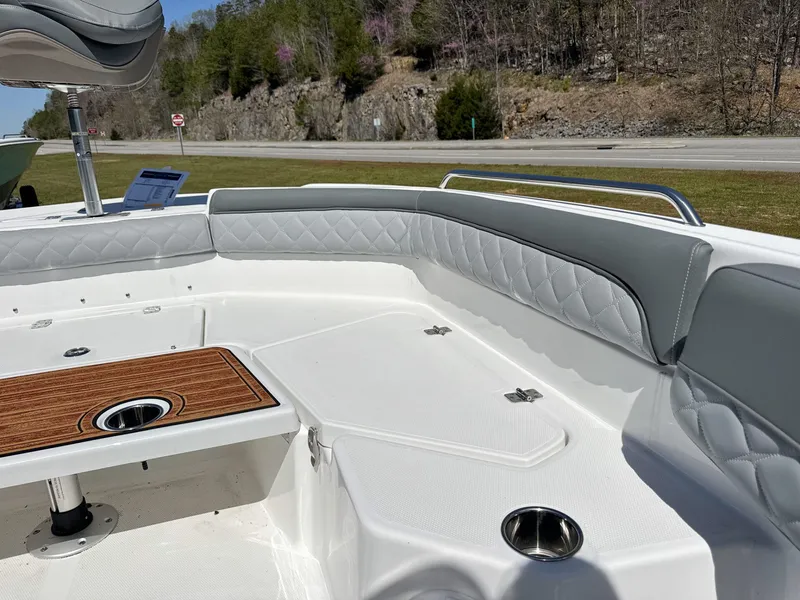 Slide: The Image of 2024 NauticStar 211 Hybrid interior with cushioned seating. - 4