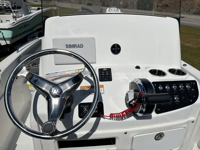 Slide: The Image of 2024 NauticStar 211 Hybrid boat console with Simrad display. - 5