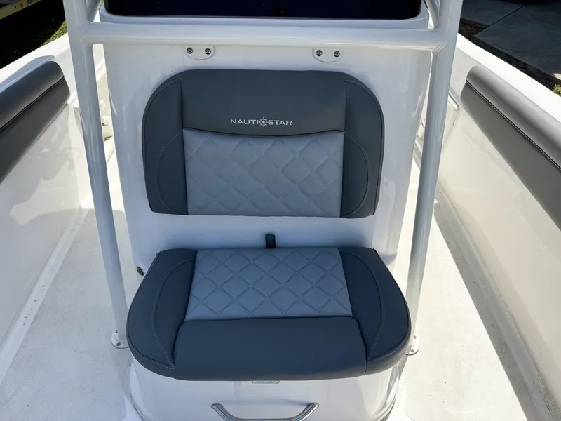 Slide: The Image of 2024 NauticStar 211 Hybrid boat seat with gray upholstery. - 7