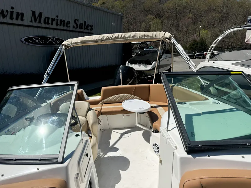 Slide: The Image of Interior of 2024 NauticStar 223 DC boat at a dealership. - 6