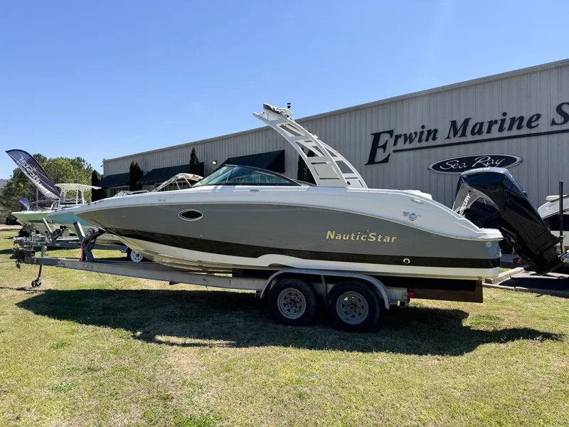 The Image of 2023 NauticStar 243 DC boat on trailer at Erwin Marine. - 1