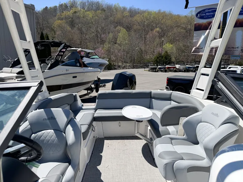 Slide: The Image of Interior of 2023 NauticStar 243 DC with luxurious seating. - 9