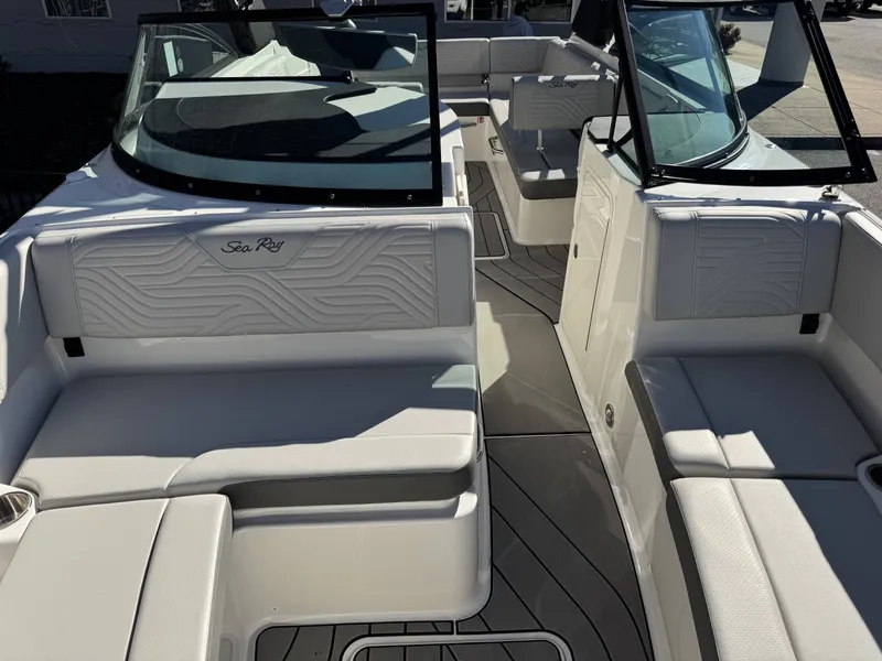 Slide: The Image of Interior of 2025 Sea Ray SDX270 SURF with luxurious seating. - 11