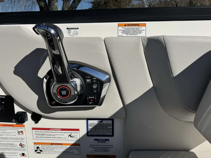 Slide: The Image of Close-up of throttle control on 2025 Sea Ray SDX270 SURF. - 17