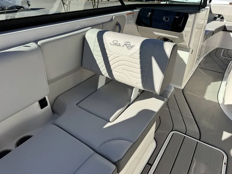Slide: The Image of Interior of 2025 Sea Ray SDX270 SURF with luxurious seating. - 25
