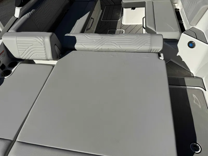 Slide: The Image of Interior of 2025 Sea Ray SDX270 SURF with gray upholstery. - 29