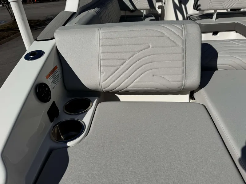 Slide: The Image of Interior of 2025 Sea Ray SDX270 SURF with gray upholstery. - 30