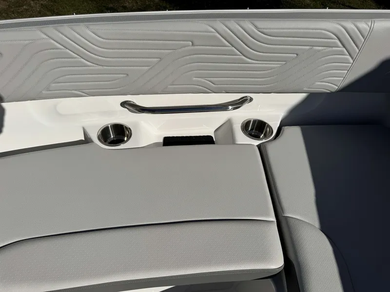 Slide: The Image of Interior of 2025 Sea Ray SDX270 SURF with gray upholstery. - 6