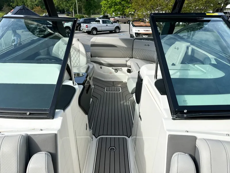 Slide: The Image of Interior of 2024 Sea Ray SXS 260 SURF with luxurious features. - 10