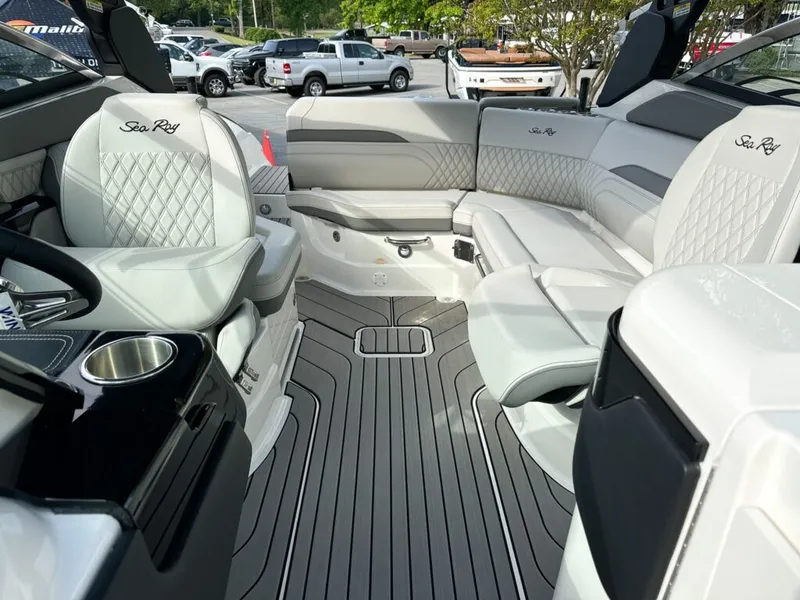 Slide: The Image of Interior of 2024 Sea Ray SXS 260 SURF with luxurious seating. - 11