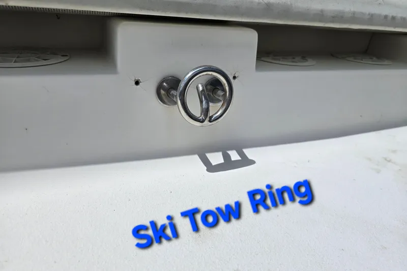 Slide: The Image of 1999 Wellcraft 186 SS/S ski tow ring with bold blue text. - 13
