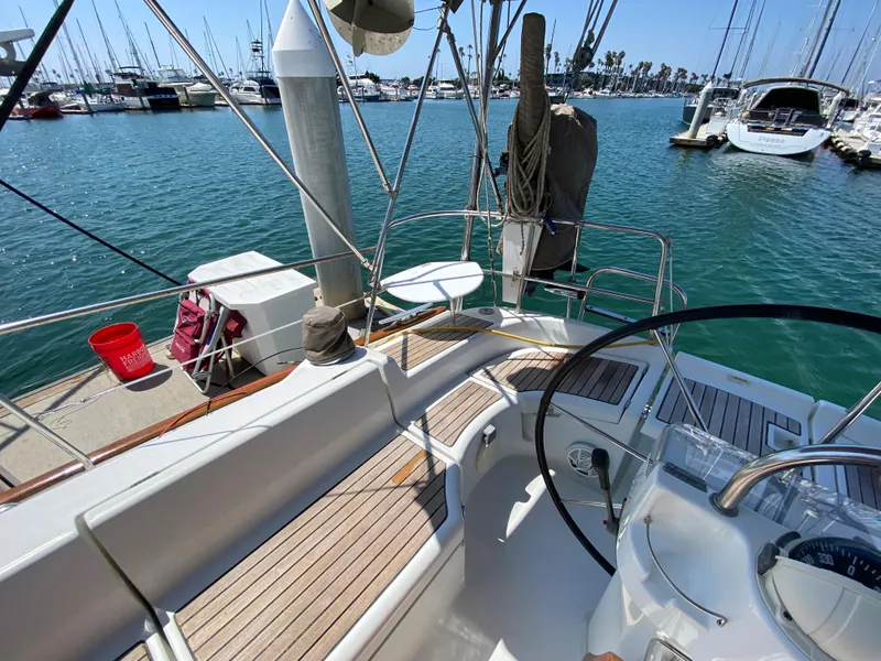Slide: The Image of Beneteau 423 sailboat cockpit, docked at marina, 2003 model. - 21