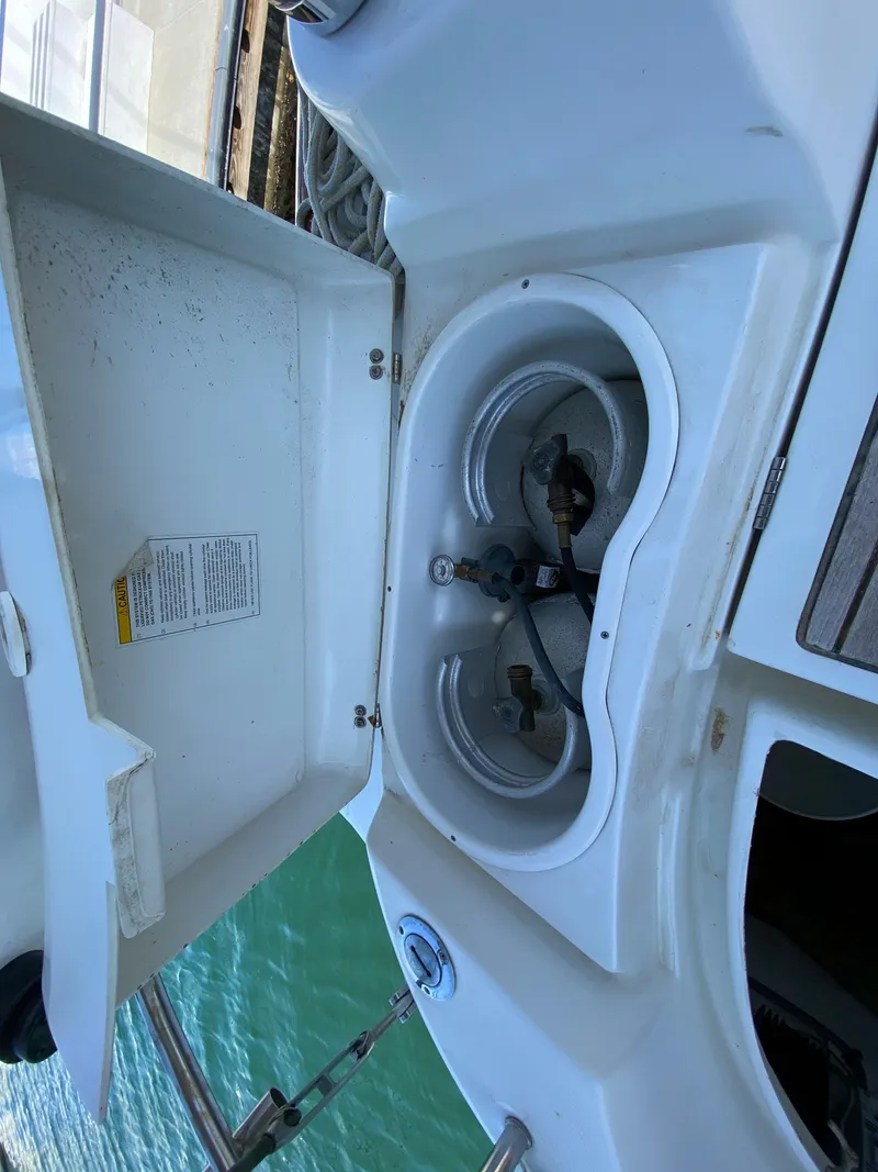 Slide: The Image of Open storage compartment on a 2003 Beneteau 423 sailboat. - 33