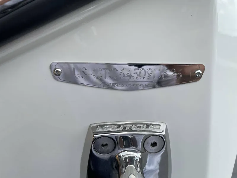 Slide: The Image of Nautique G23 2026 boat plaque with serial number. - 19