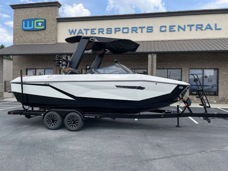 Slide: The Image of 2026 Nautique G23 boat parked at Watersports Central. - 20