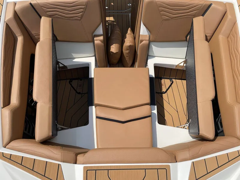 Slide: The Image of Interior of 2026 Nautique G23 with luxurious leather seating. - 28