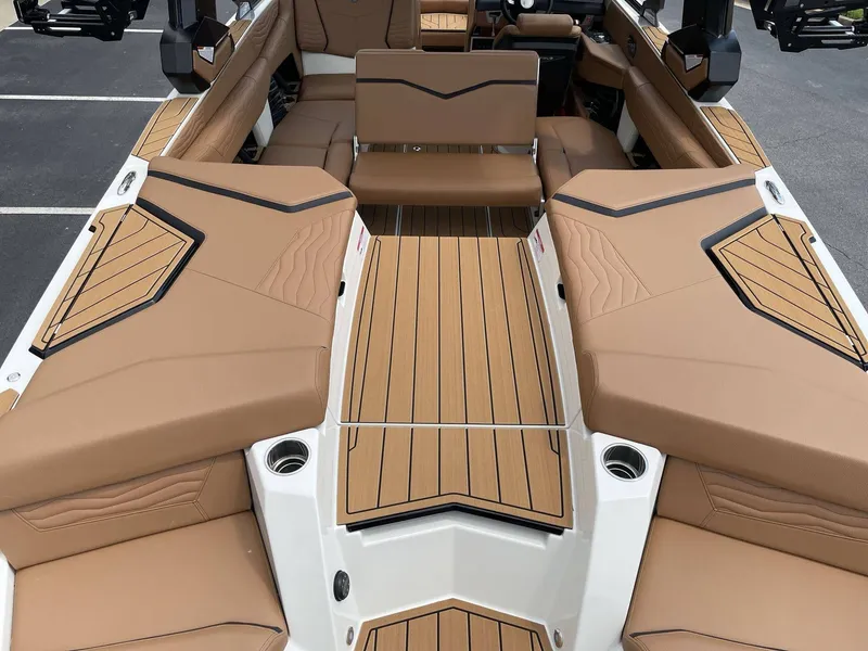 Slide: The Image of 2026 Nautique G23 interior with luxurious seating. - 30